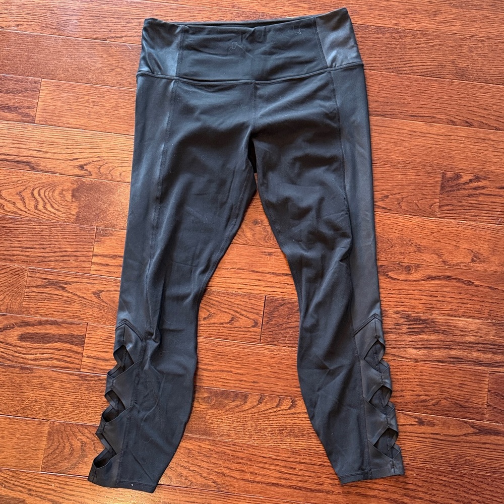 Athleta Black High-Waisted Leggings with Side Cutouts size medium